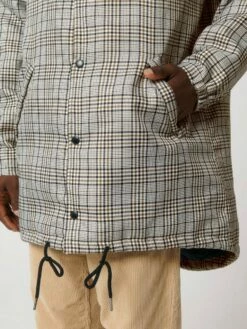 Unisex Padded Parka Aus Recyceltem Polyester - Beige Tweed Check -Grundstoff Verkaufsladen Detail Seitentasche abgerundeter Saum U947 829 1280x1280